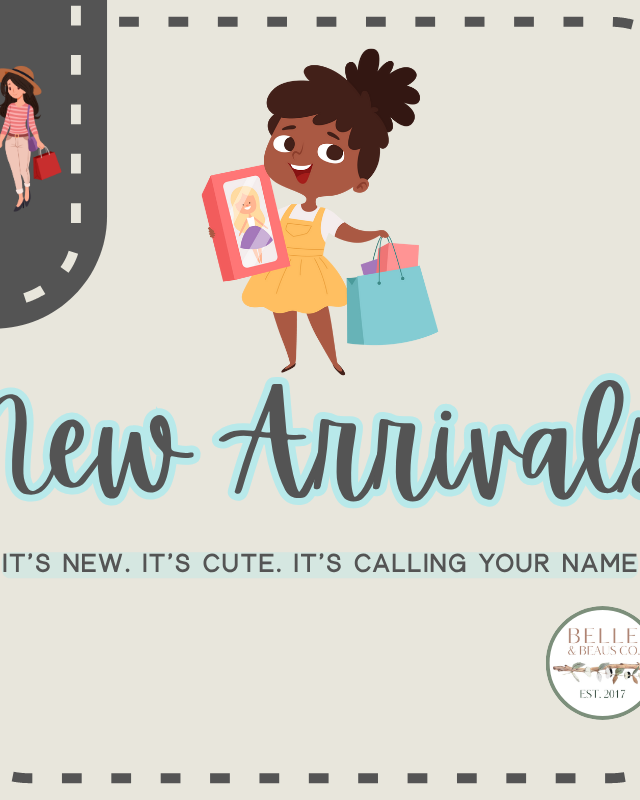 Little girl full of joy holding her shopping bag, capturing the excitement of new arrivals at Southern Belle & Beaus.