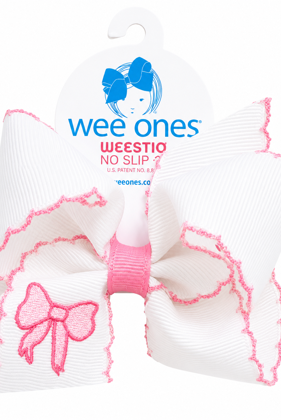 White hair bows with pink accents and 'wee ones' branding on a white background
