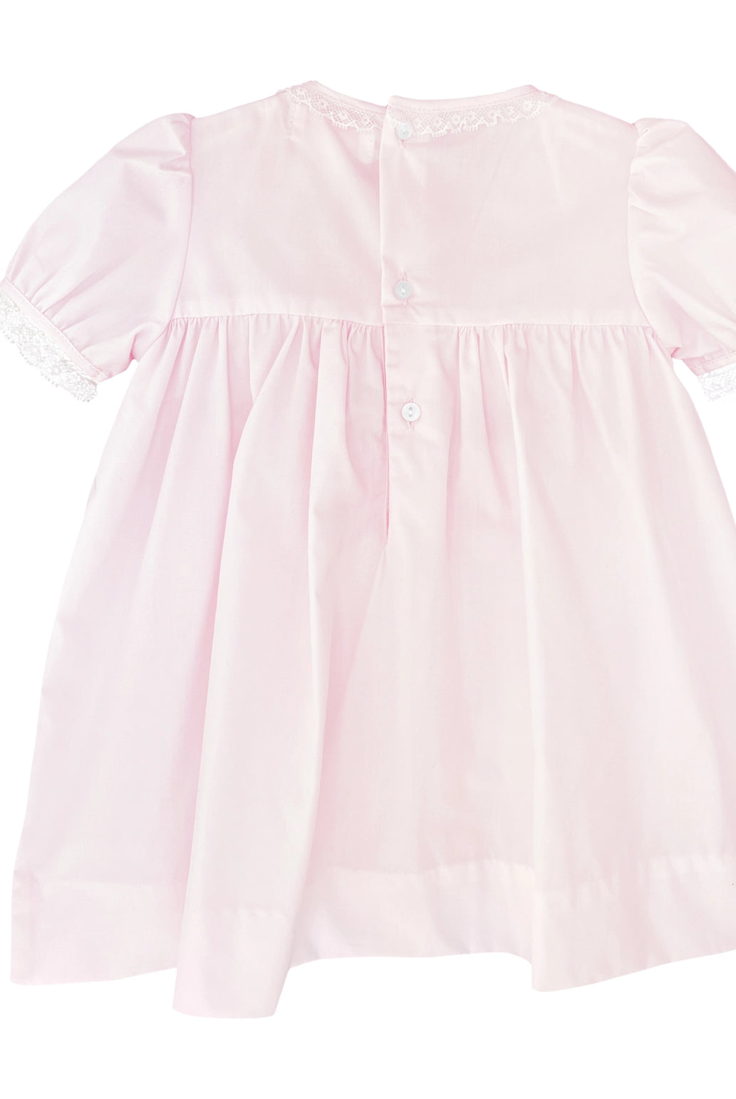 Pink baby dress with short sleeves on a white background