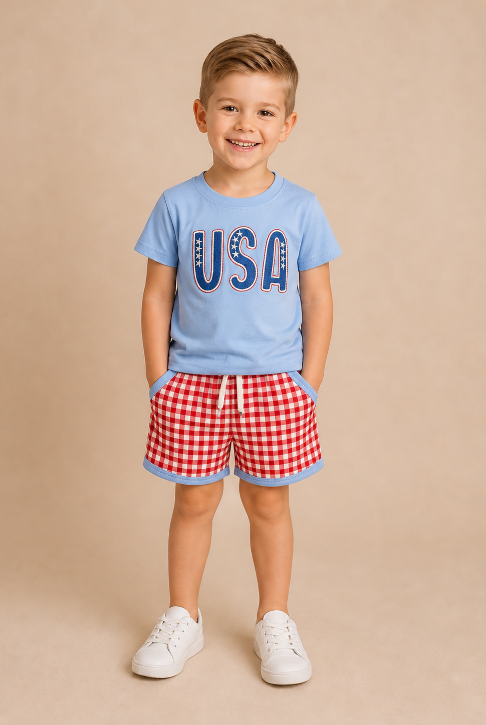 Child wearing a blue 'USA' t-shirt and red checkered shorts on a beige background