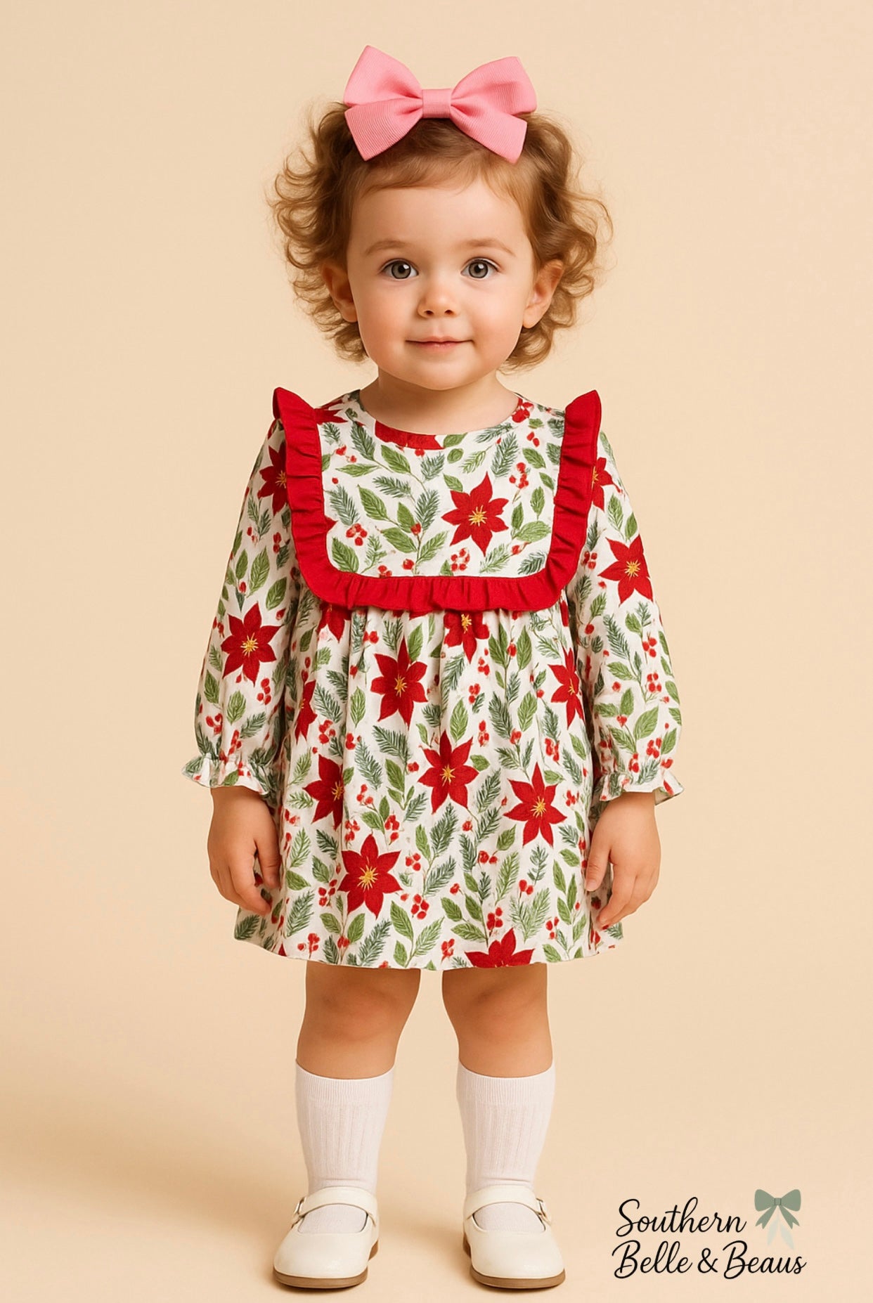 Child wearing a festive dress with red and green floral pattern on a beige background