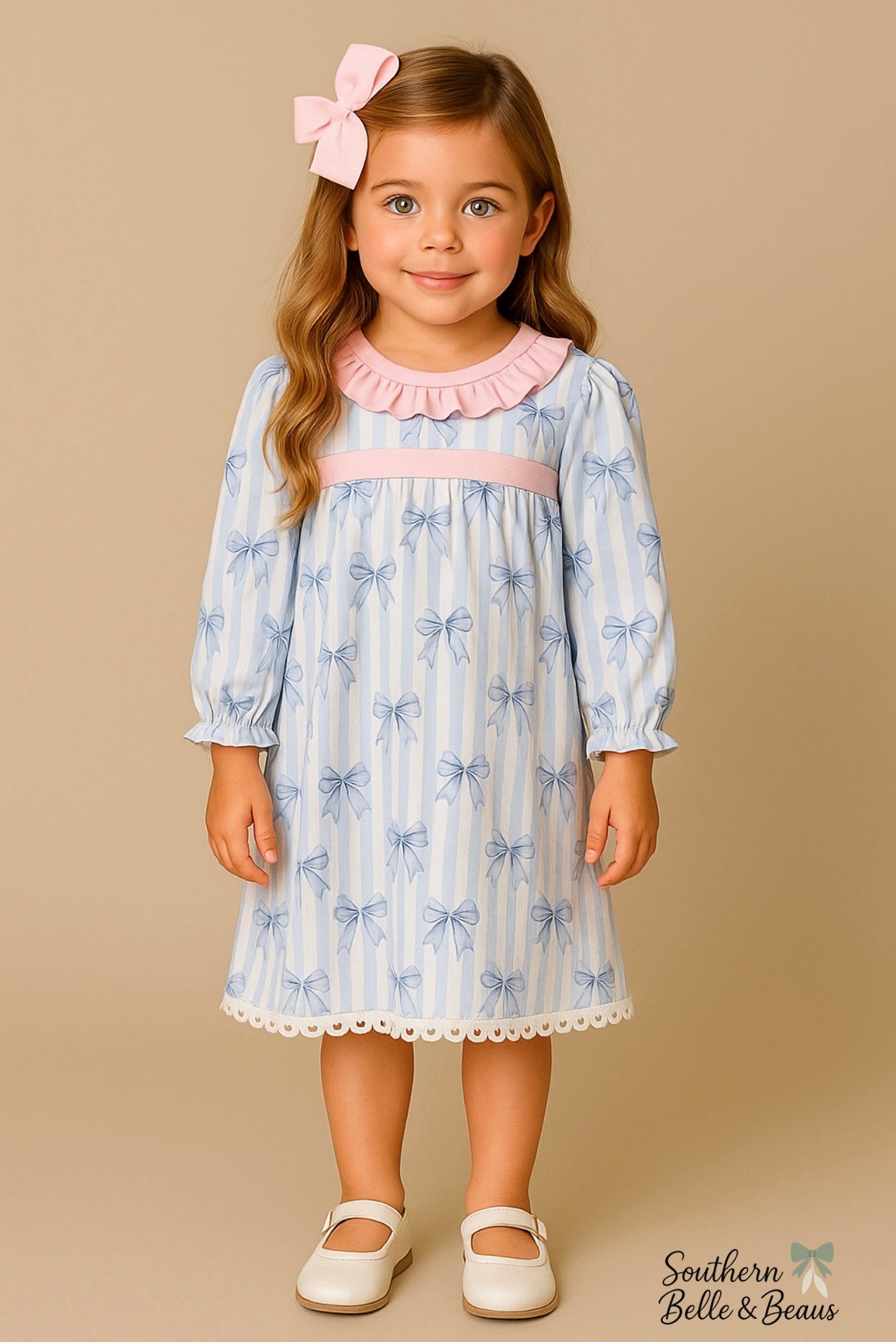 Girls Bows & Beauty dress with blue bow print and pink ruffle neckline
