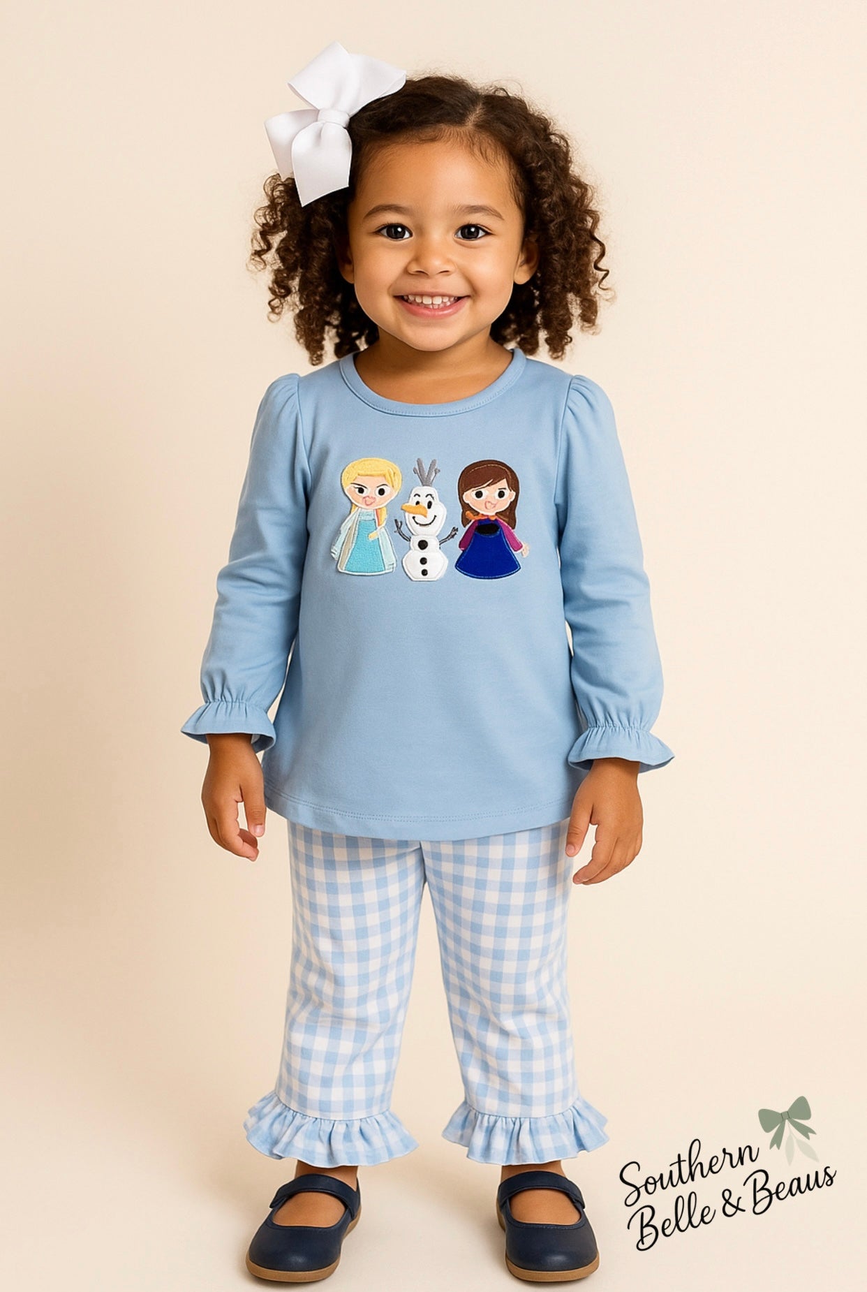 Light blue girls pant set with embroidered winter characters and gingham ruffle pants.