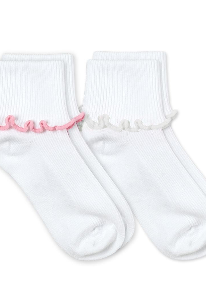 A pair of white socks with a pink ripple edge trim.