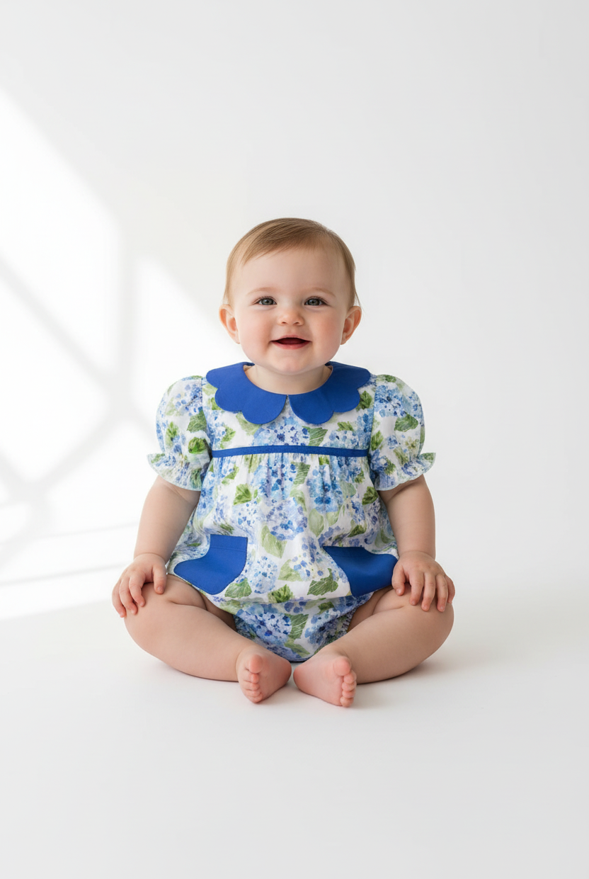Baby girl wearing Ag's Floral Perfection bubble romper - front view