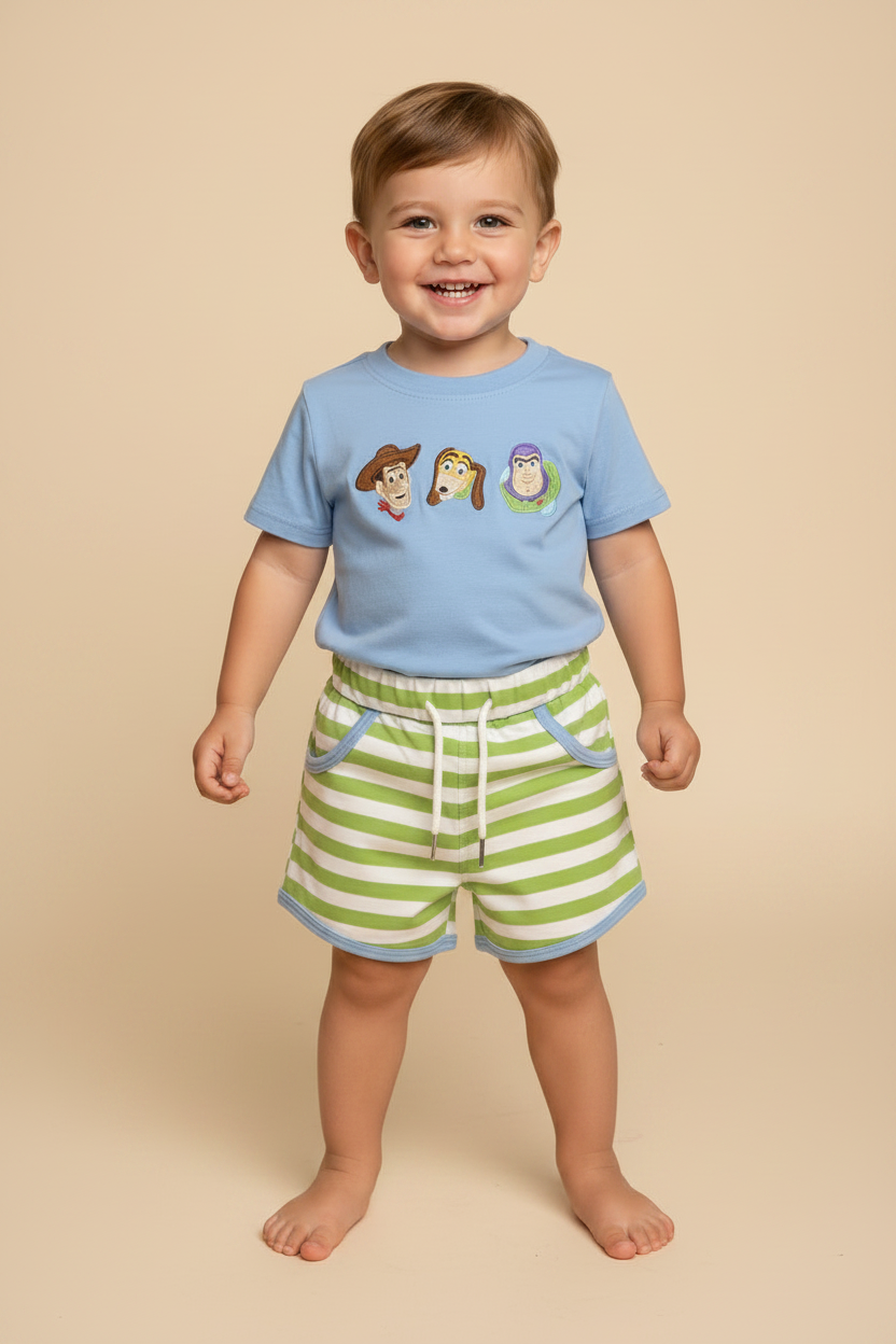 Toddler boy wearing Beyond the Toy Box Short Set on beige background