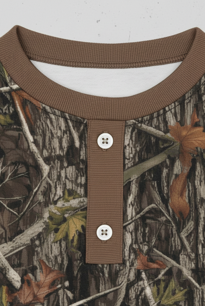 Close-up of camo henley collar and button placket detail