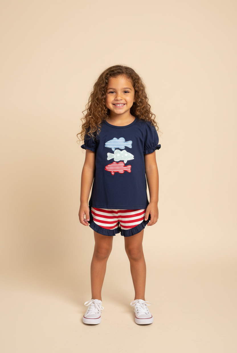 Girl model wearing navy blue shirt with patriotic fish.