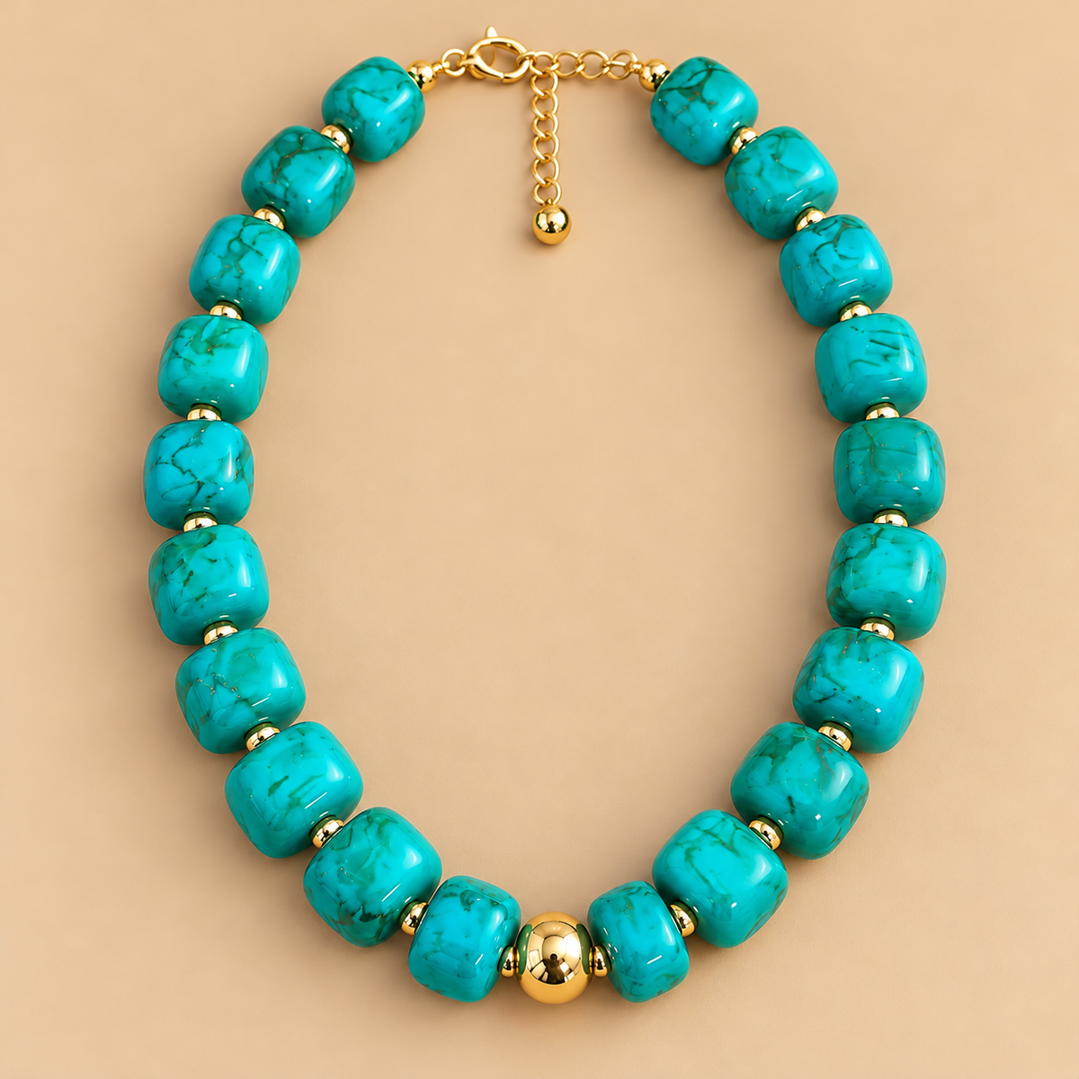 Turquoise Marble Bead Necklace is a women's turquoise green beaded statement necklace with gold-tone accents.