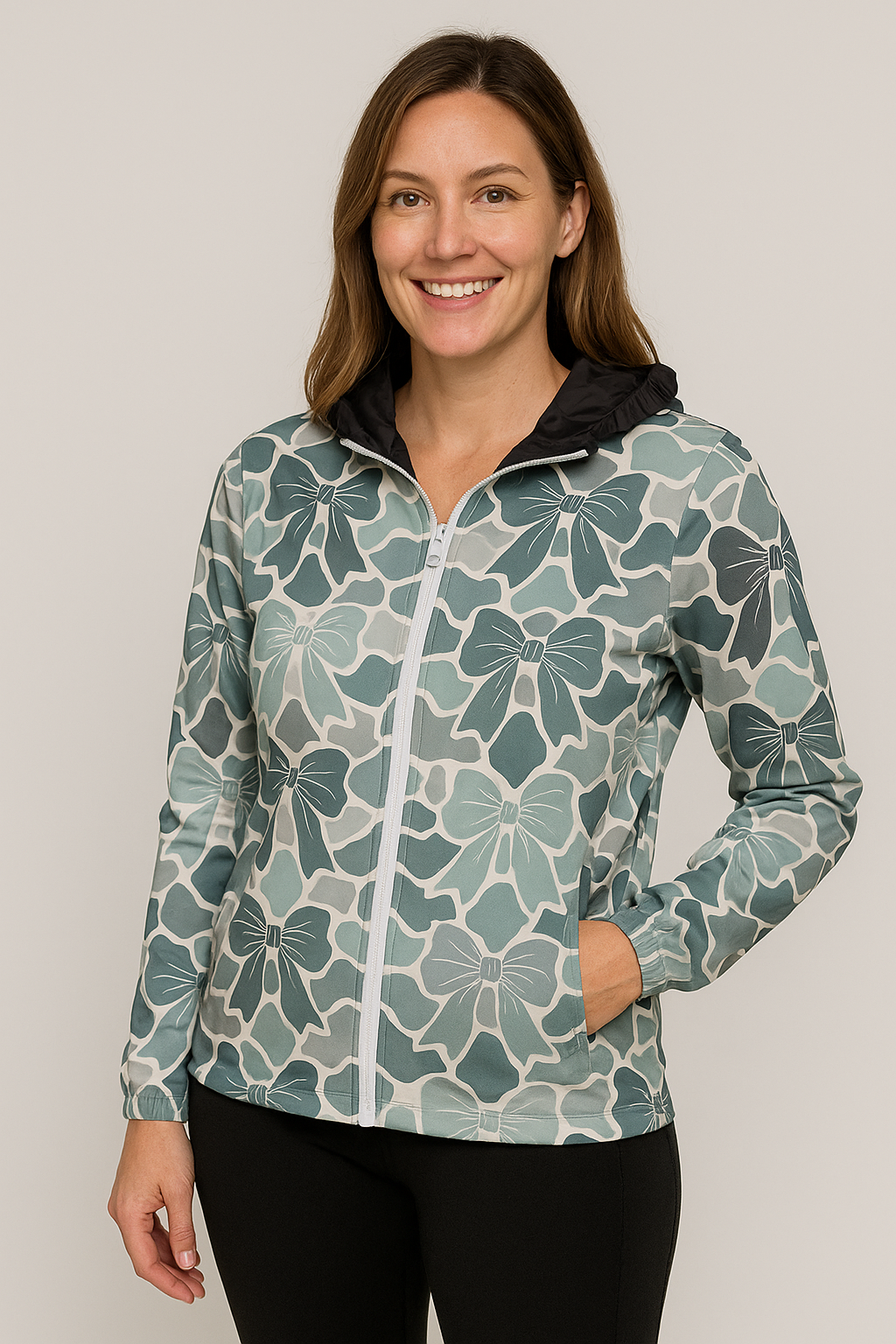 Child wearing a patterned jacket, gray shirt with text, blue jeans, and brown boots on a beige background

