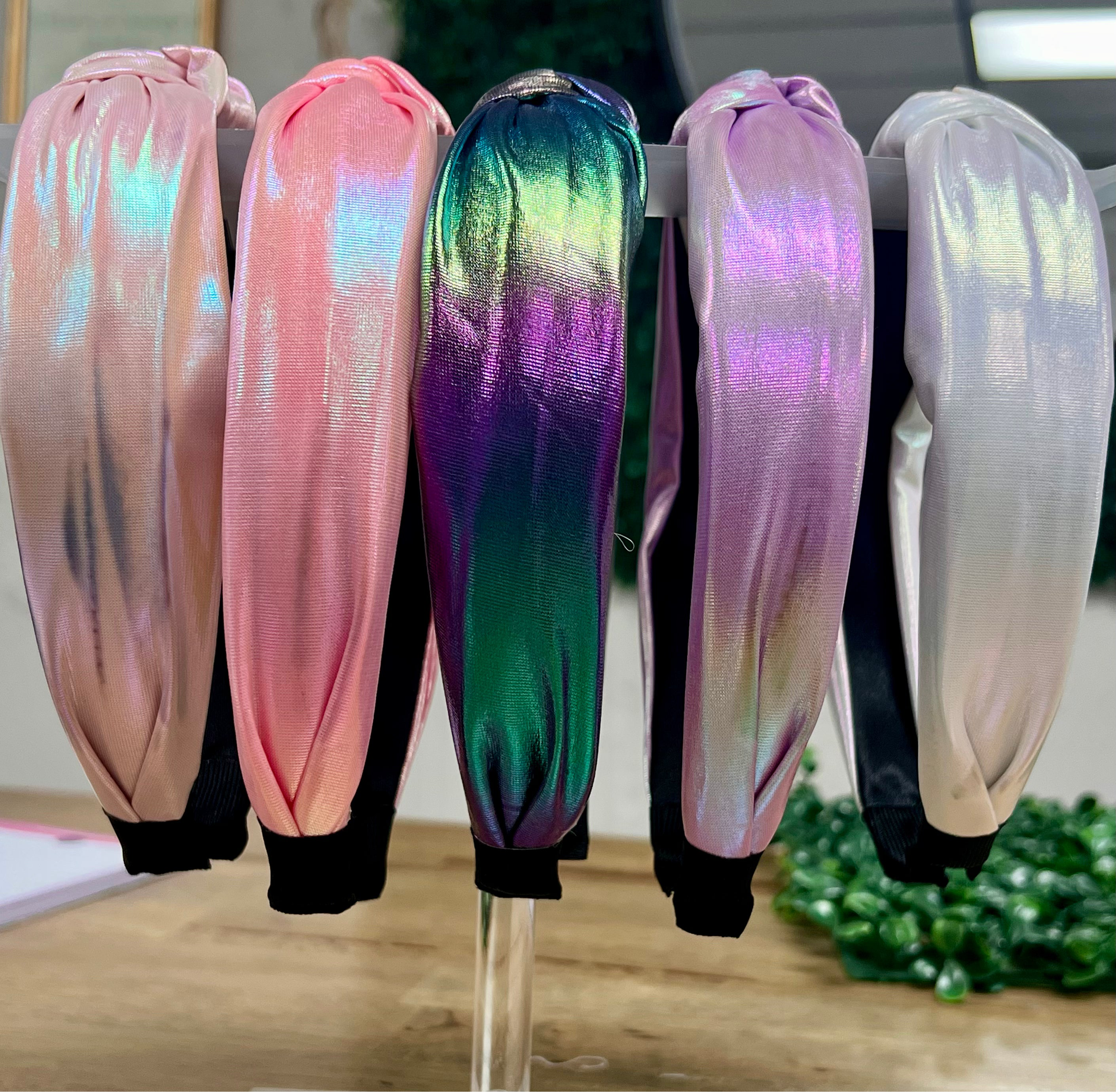 Set of colorful headbands on a stand with a blurred background