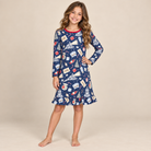 Tween girl wearing a polar express print bamboo gown.