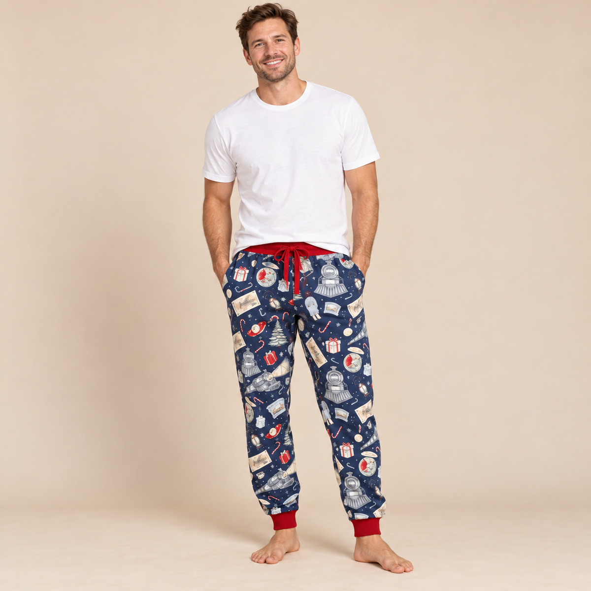 Man wearing a white tee and polar express bamboo joggers.