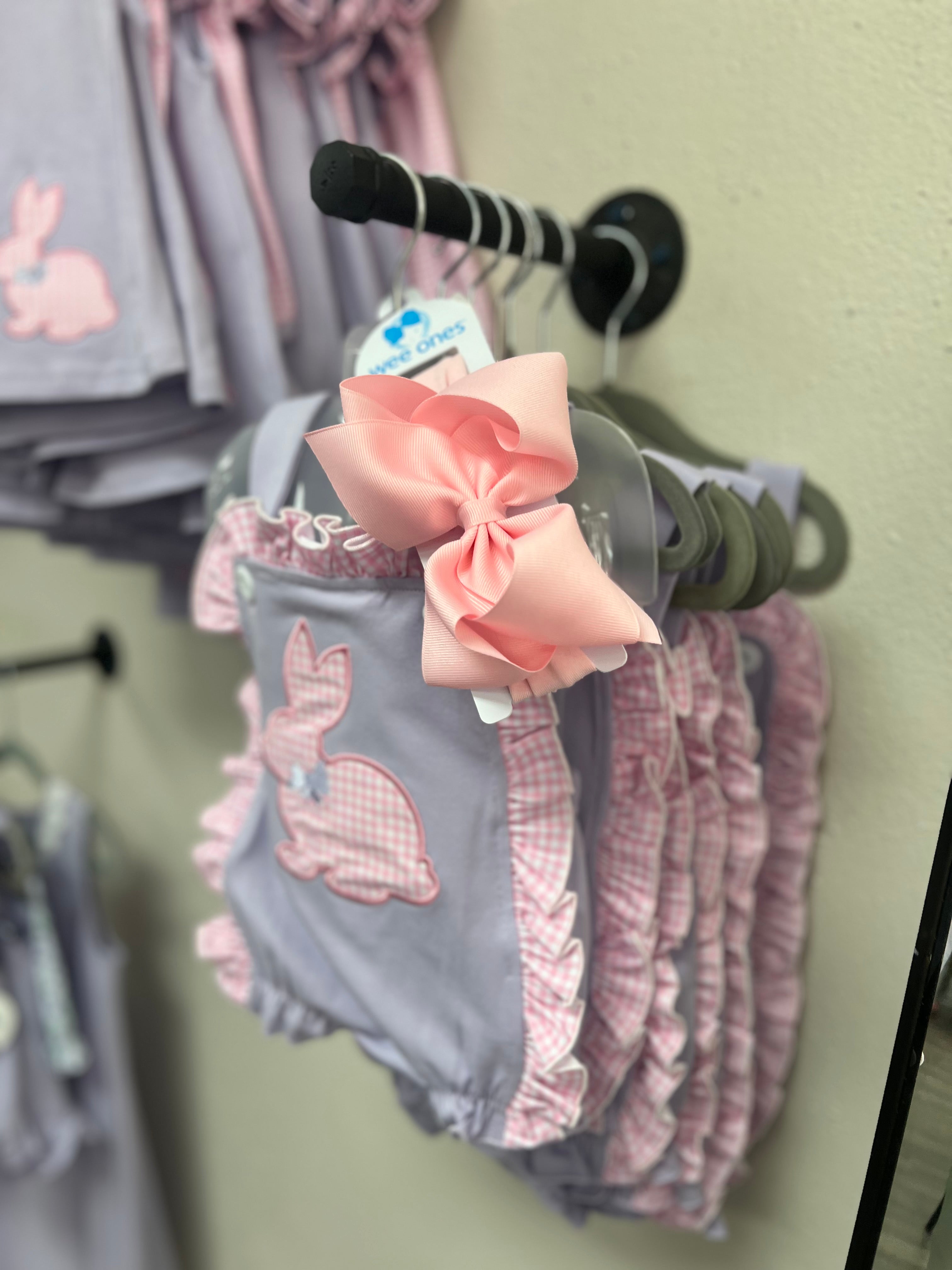 Purple baby sun suit bubble, trimmed in pink gingham with a pink gingham bunny.