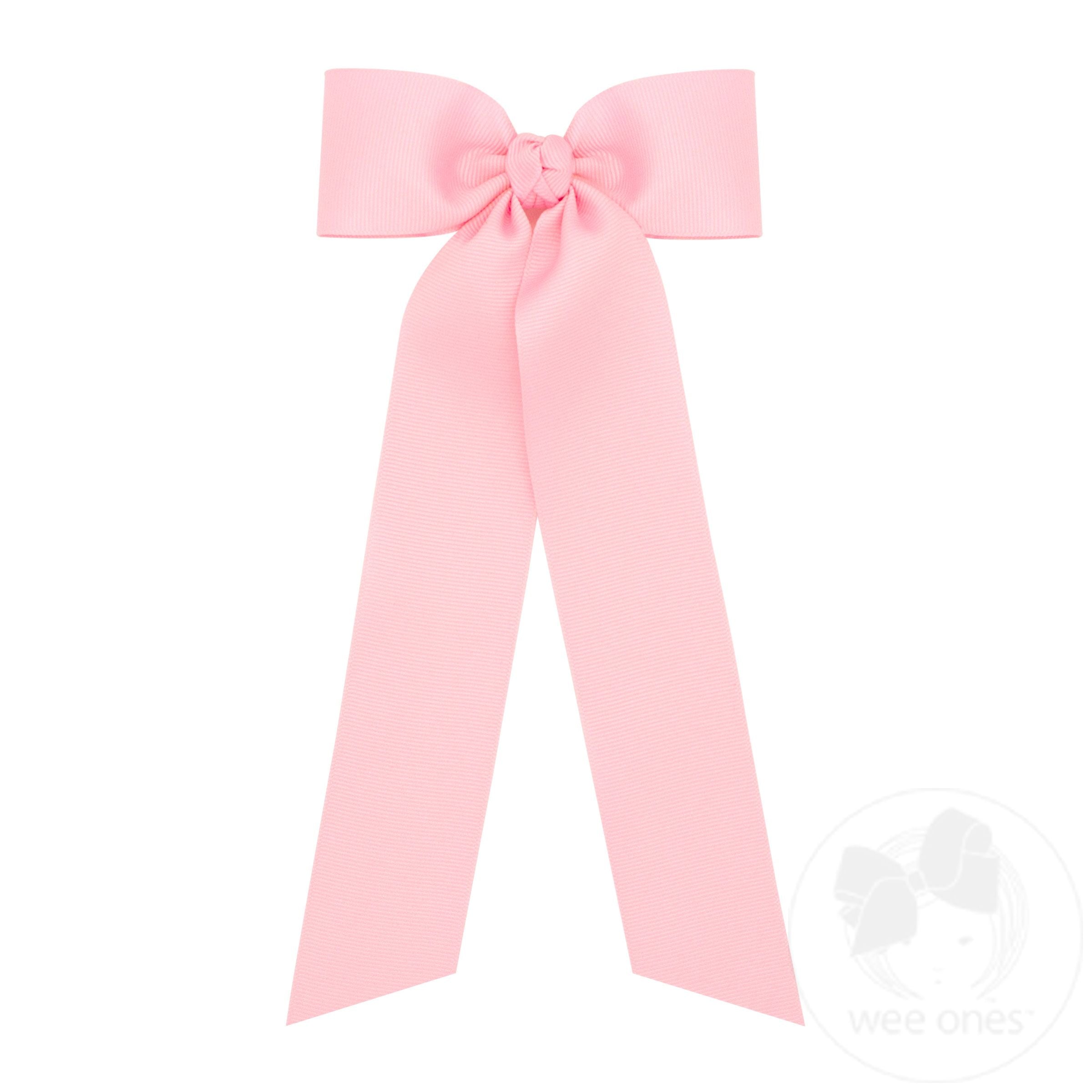 Medium grosgrain bowtie with streamer tails in light pink