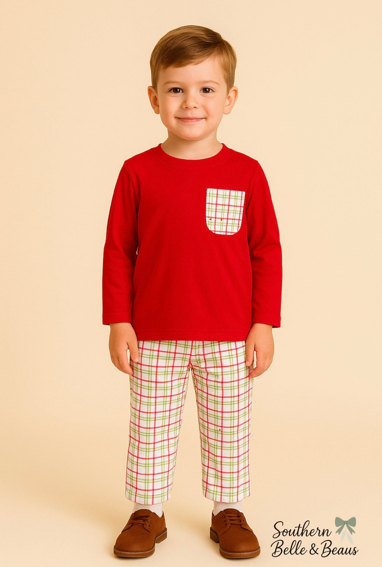 Red long sleeve shirt with a Christmas themed plaid print pocket with matching pants.