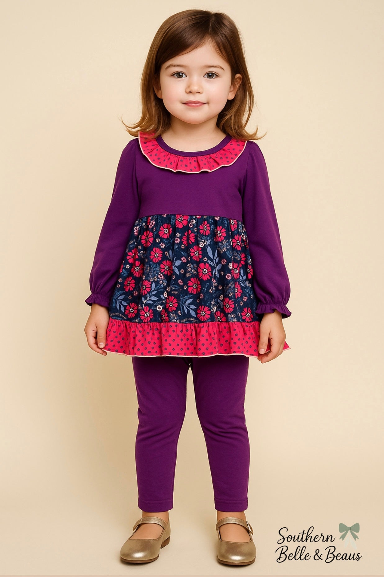 Young girl wearing a purple outfit with floral and polka dot patterns on a beige background