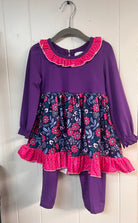 Girls’ purple long-sleeve pant set with a floral and polka dot ruffle tunic top and coordinating purple leggings.