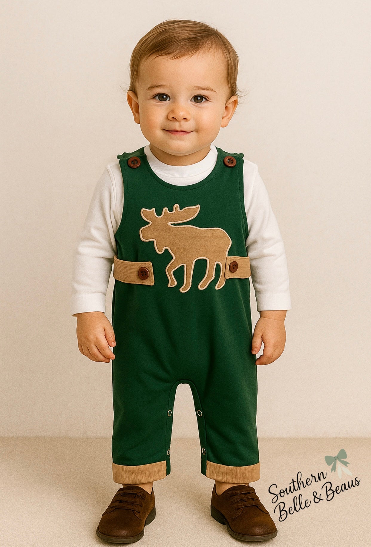 Green longalls with buttons, corduroy moose appliqué and snaps for easy accessibility. 