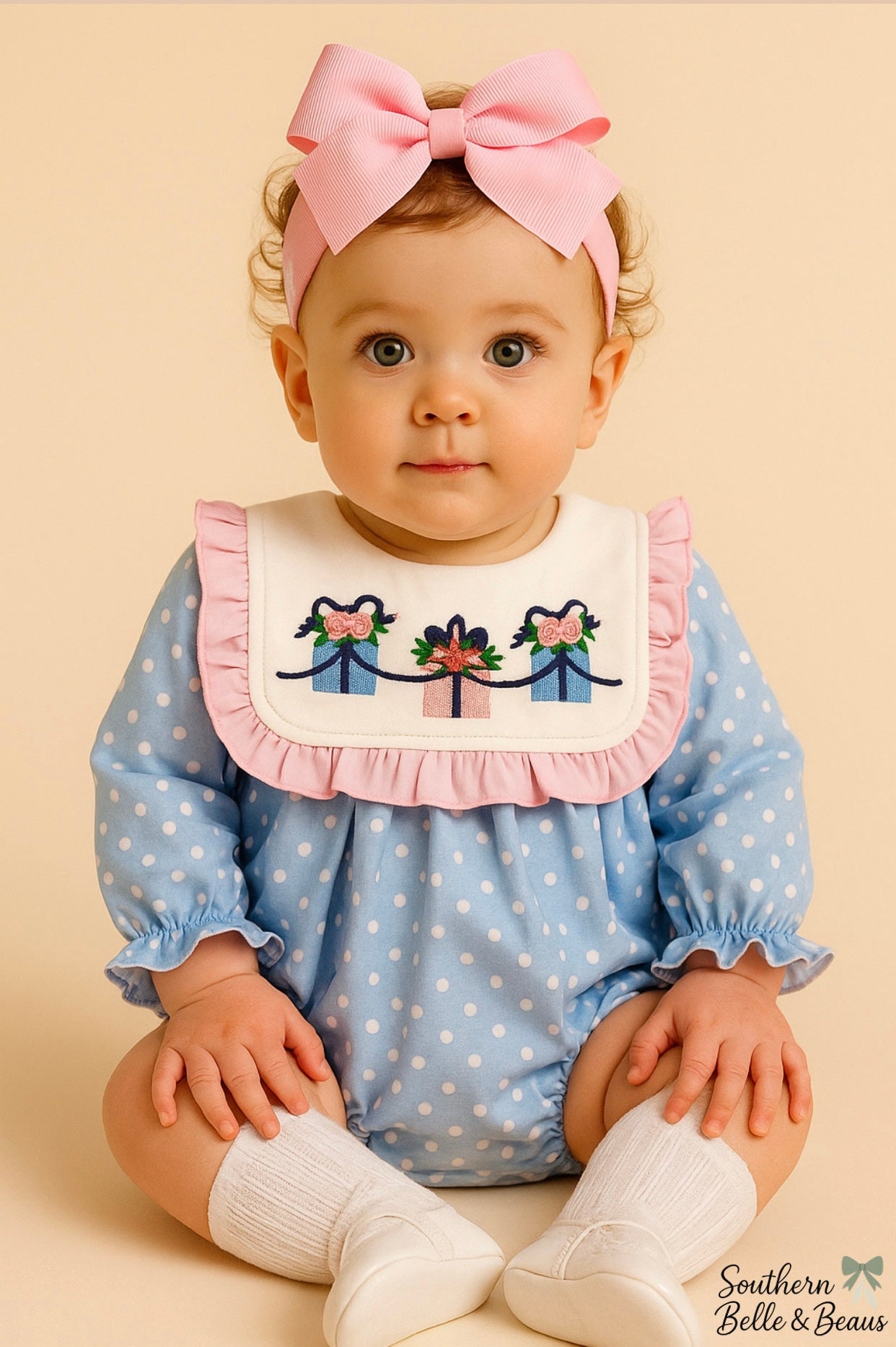 Blue polka dot baby bubble with pink ruffles and embroidered gift boxes — Wrapped With Love