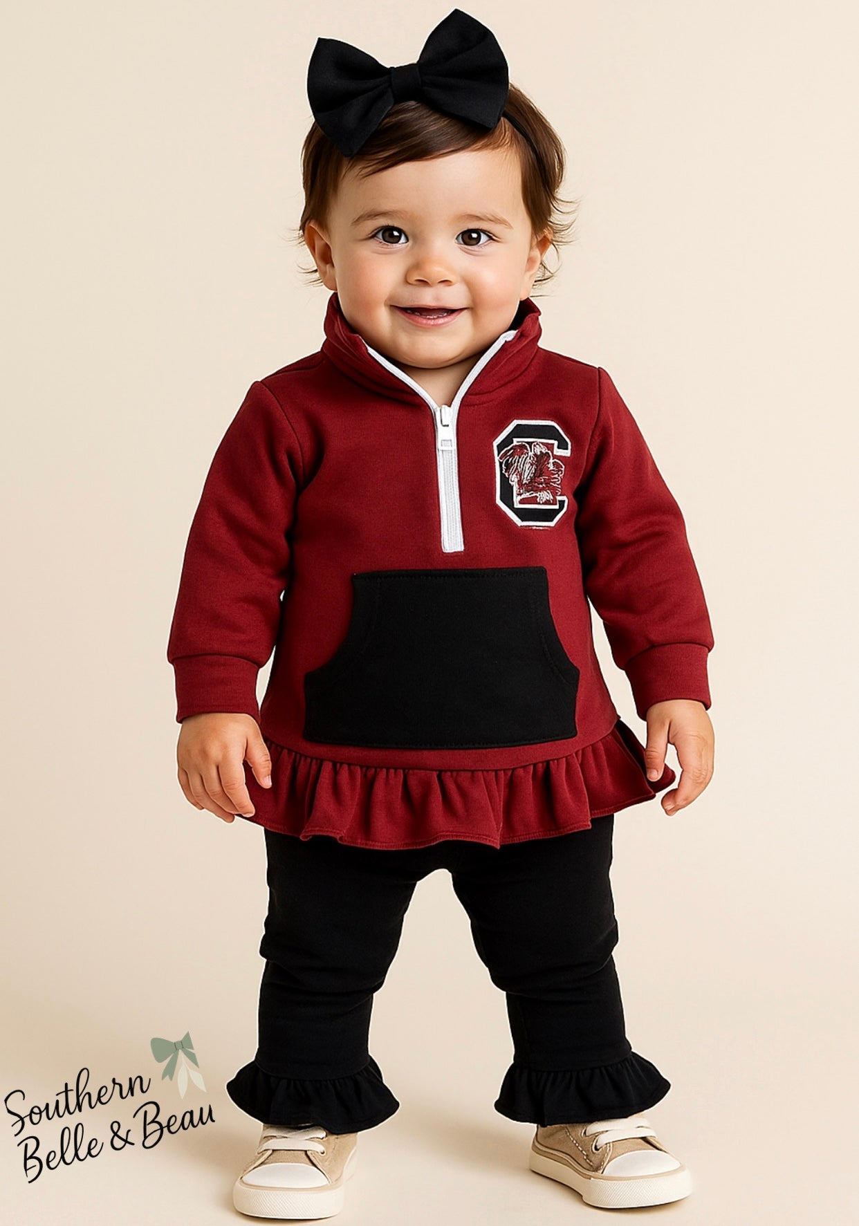 classic garnet color with an embroidered Gamecock logo, this soft quarter-zip pullover.