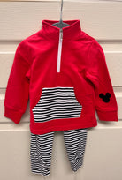 Red quarter-zip jogger set for boys featuring black-and-white striped joggers, matching striped pocket, and a small black mouse silhouette on the sleeve.