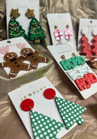 Set of Christmas-themed earrings on display.