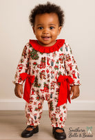 Festive vintage Christmas romper with red bows on the side, snaps for easy accessibility.