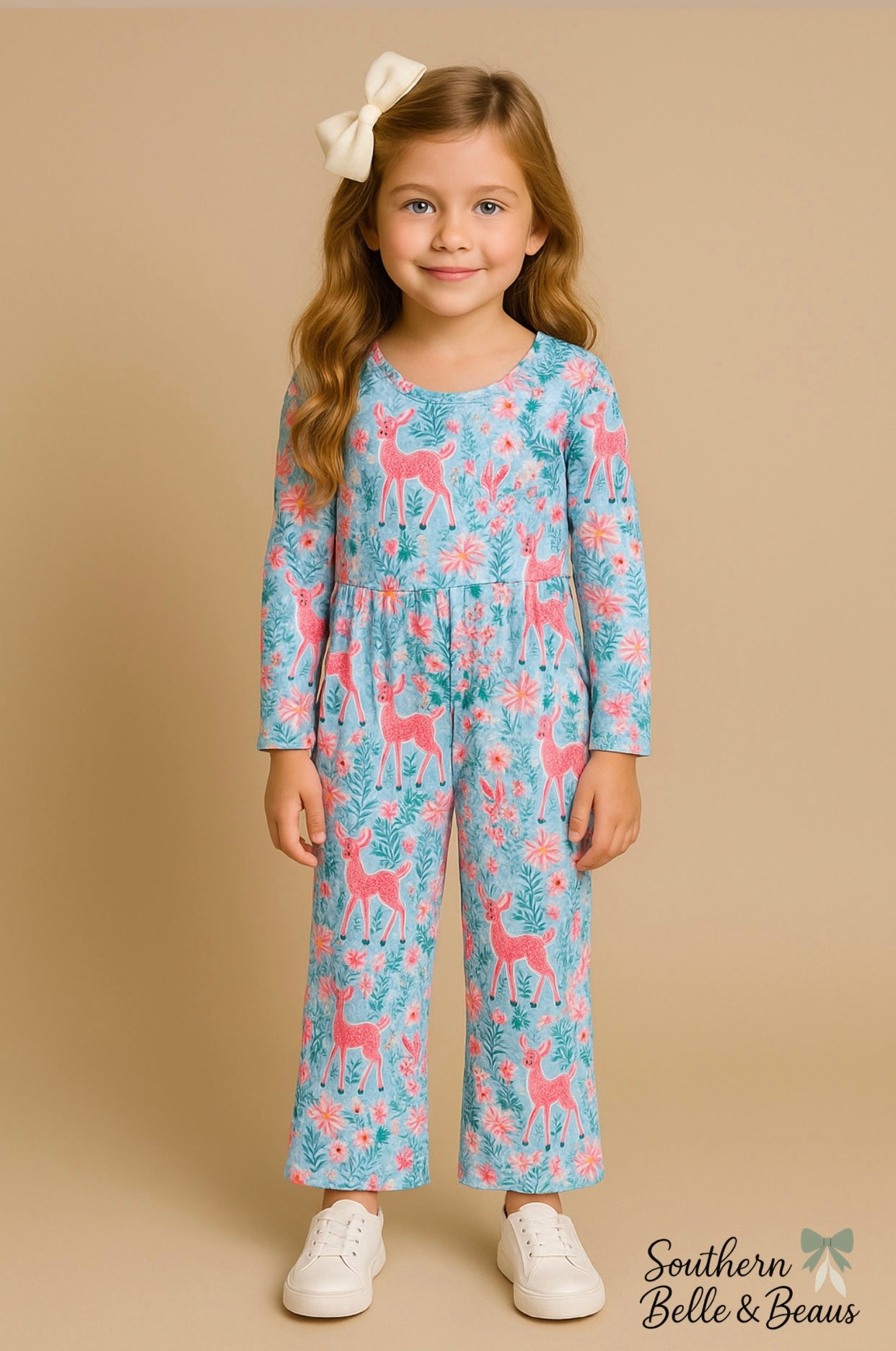 Girls’ long-sleeve jumpsuit with pink deer and floral print on a light blue background.