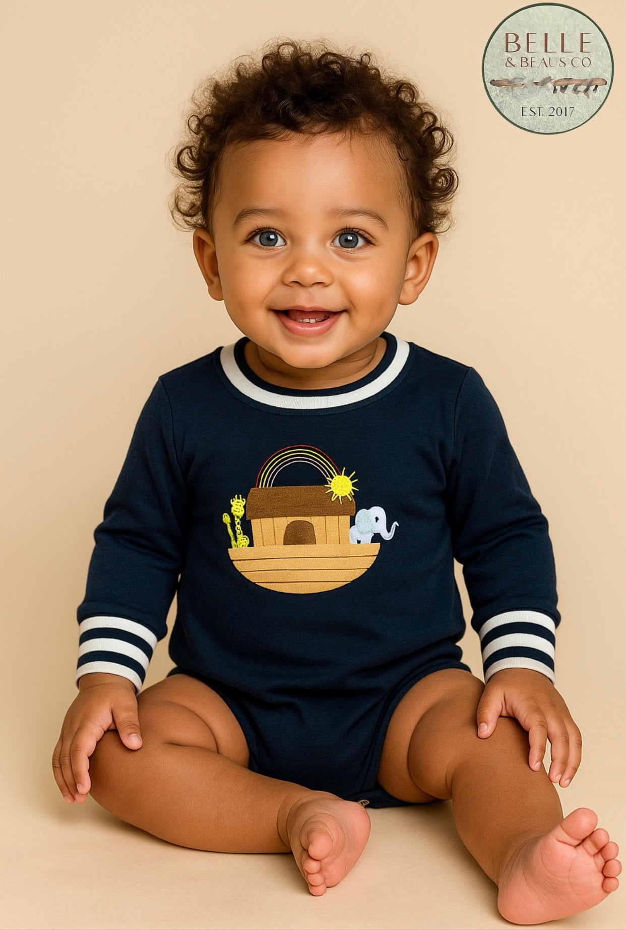 Baby boy navy bubble with embroidered Noah’s Ark, giraffes, rainbow and striped cuffs