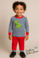 Stripped jogger with a dinosaur tangled in Christmas lights appliqué.