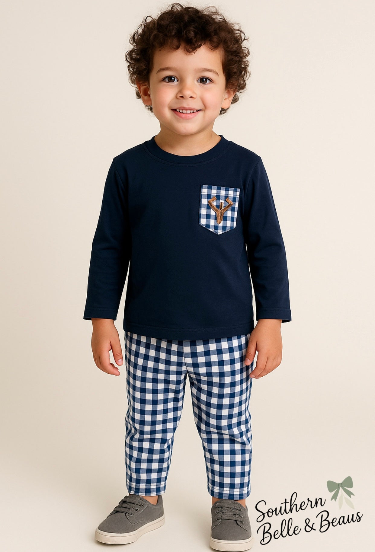Navy long sleeve top with gingham pocket and a deer embroidered, navy gingham jogger pants. 