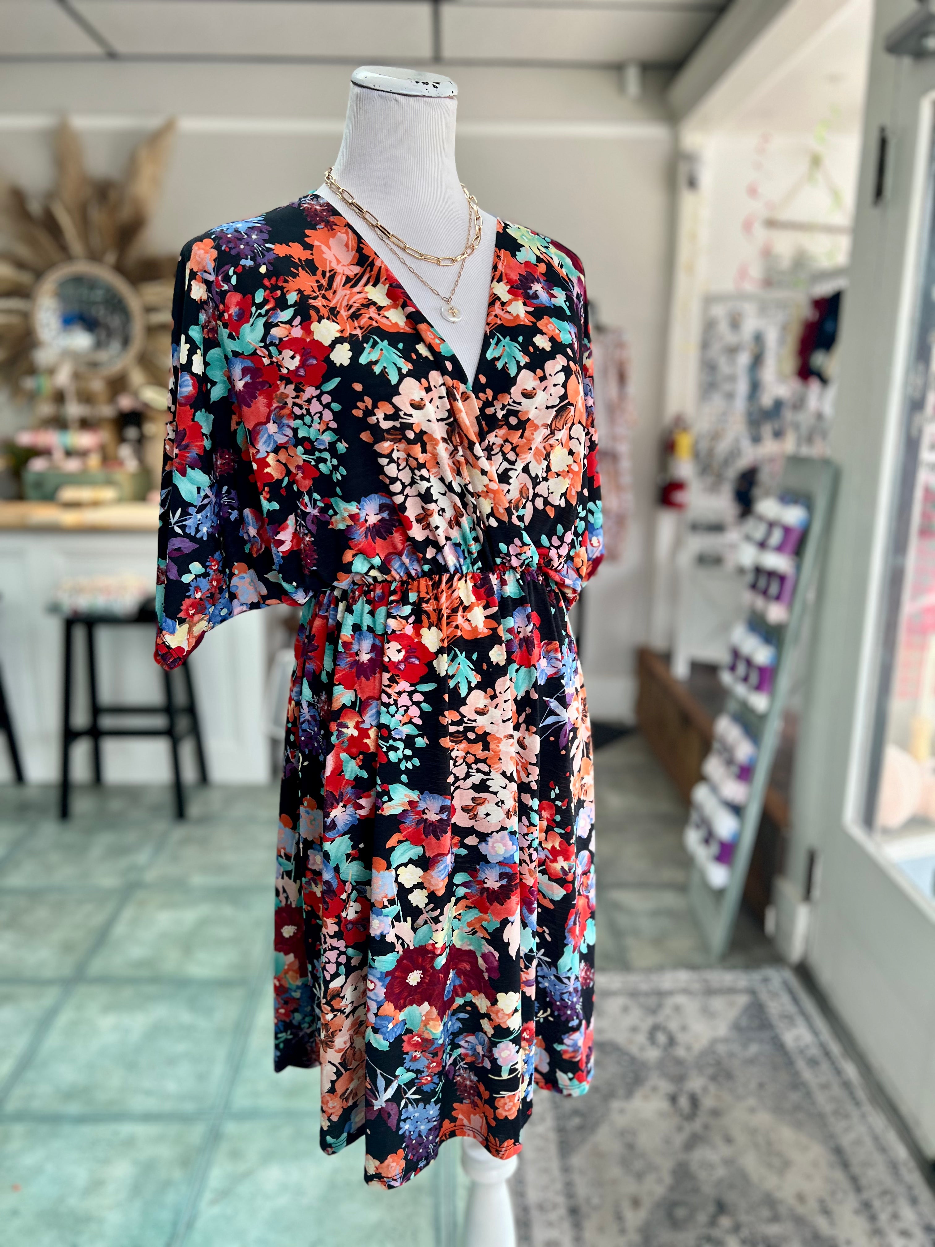 Floral, flutter sleeve, wrap midi ladies dress. 