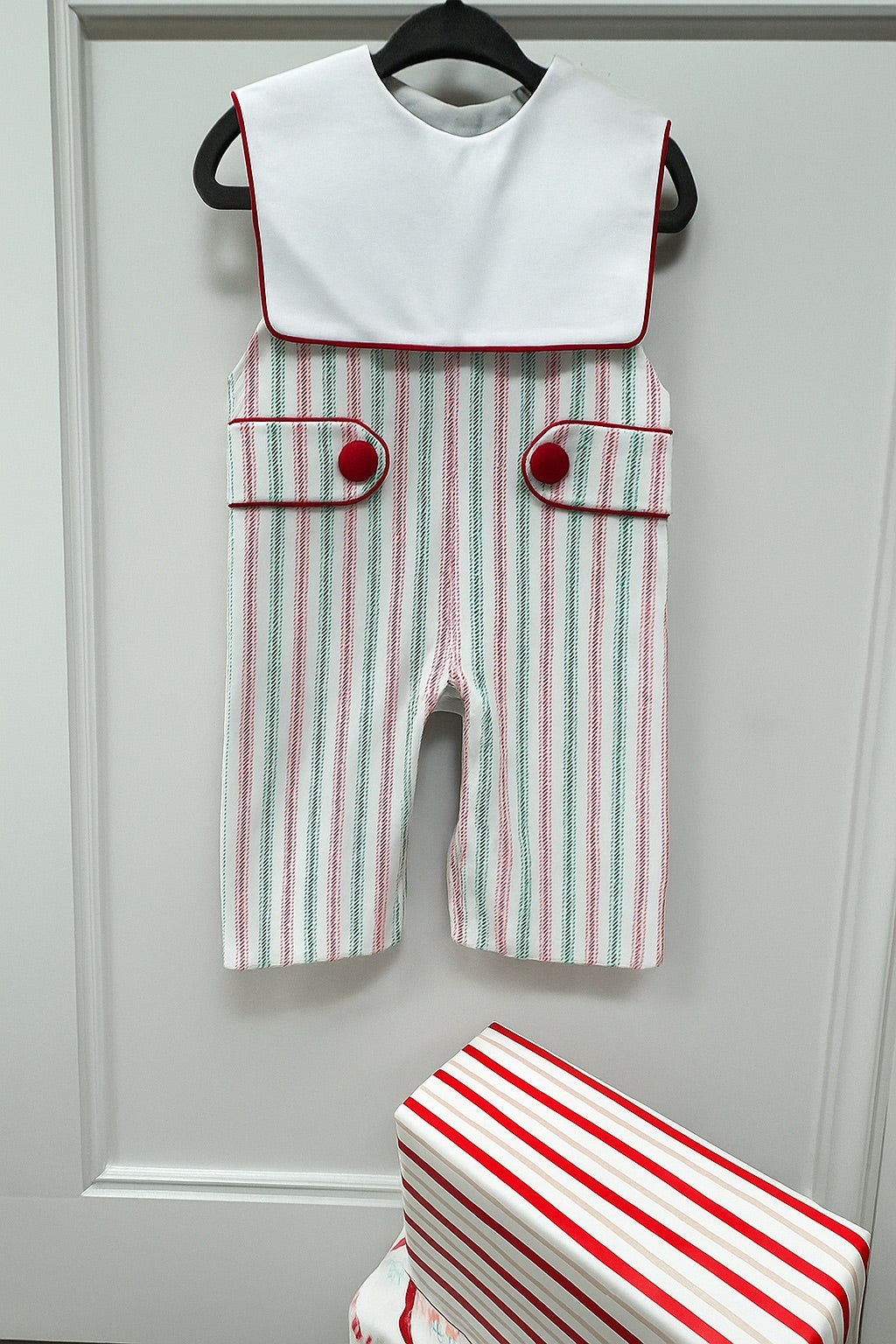 Christmas striped boy smocked romper with white bib.
