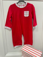 Red boys long sleeve romper with Christmas plaid pocket and plaid trim on sleeve, collar, and cuff