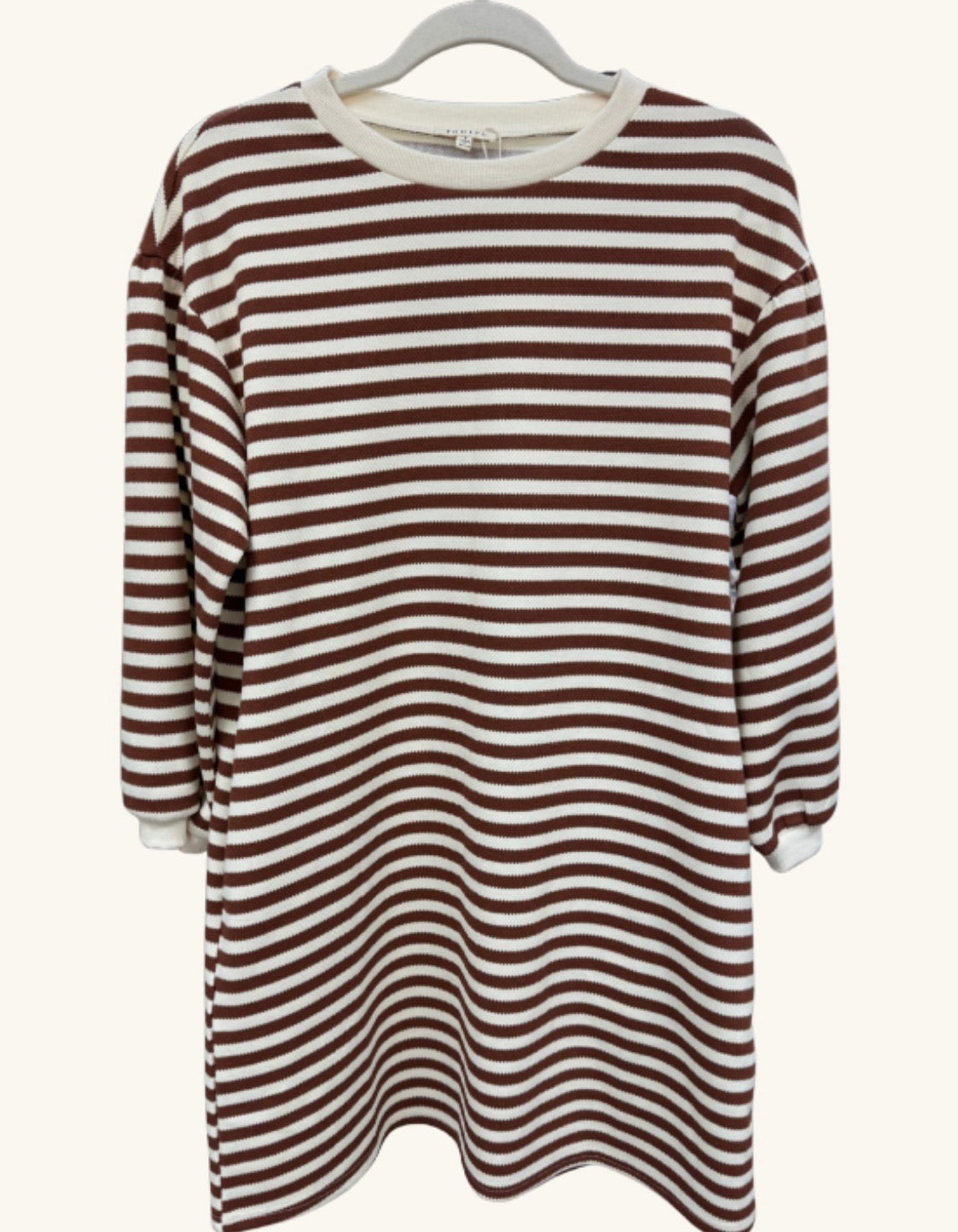 The Rootbeer Roads Top combines cozy comfort and classic style with its ribbed knit fabric and warm brown-and-ivory stripes — a perfect go-to for any casual day.