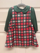 Classic red and green plaid girls’ Christmas dress with evergreen knit top and peter pan collar — perfect for timeless Southern holiday style.