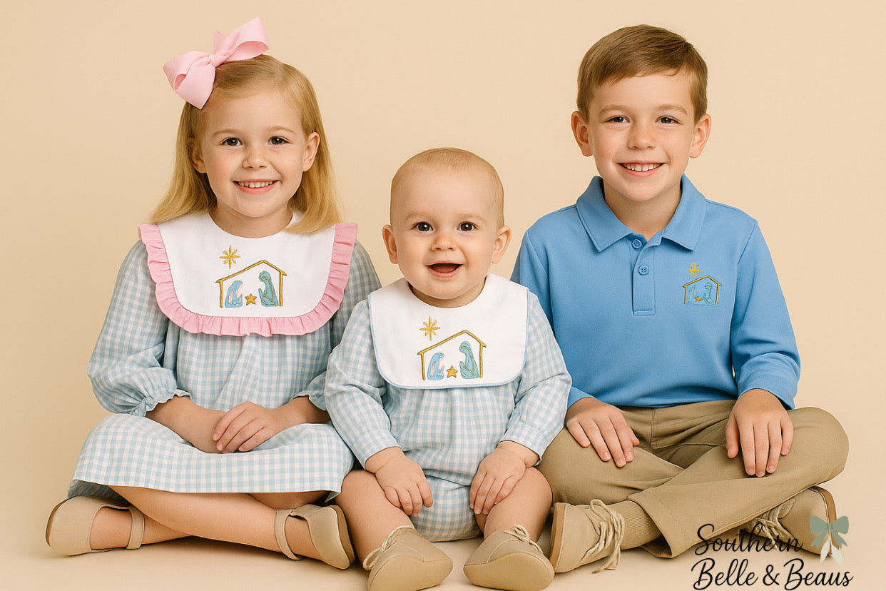 Three children wearing matching outfits with a religious design on a beige background
