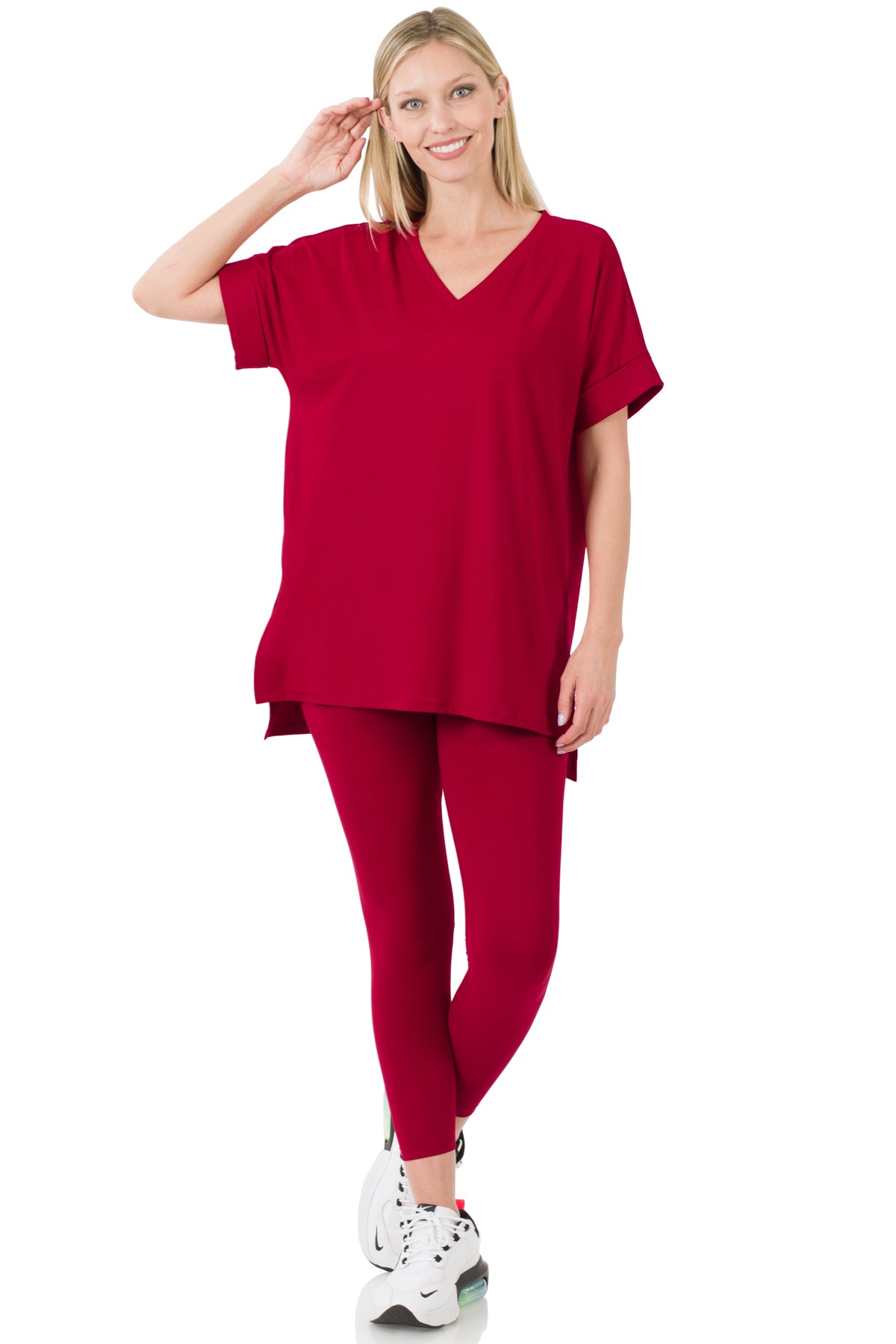 Woman wearing a red outfit on a white background