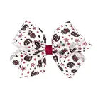 Large decorative bow with skull pattern on a white background