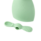 Mint green baby spoon and container set on a white background