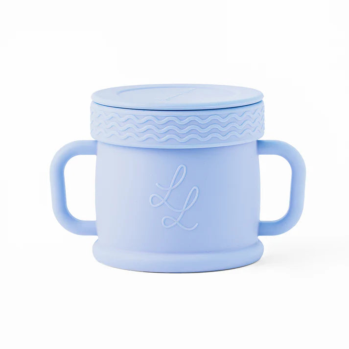 Light blue mug with handles and a lid on a white background