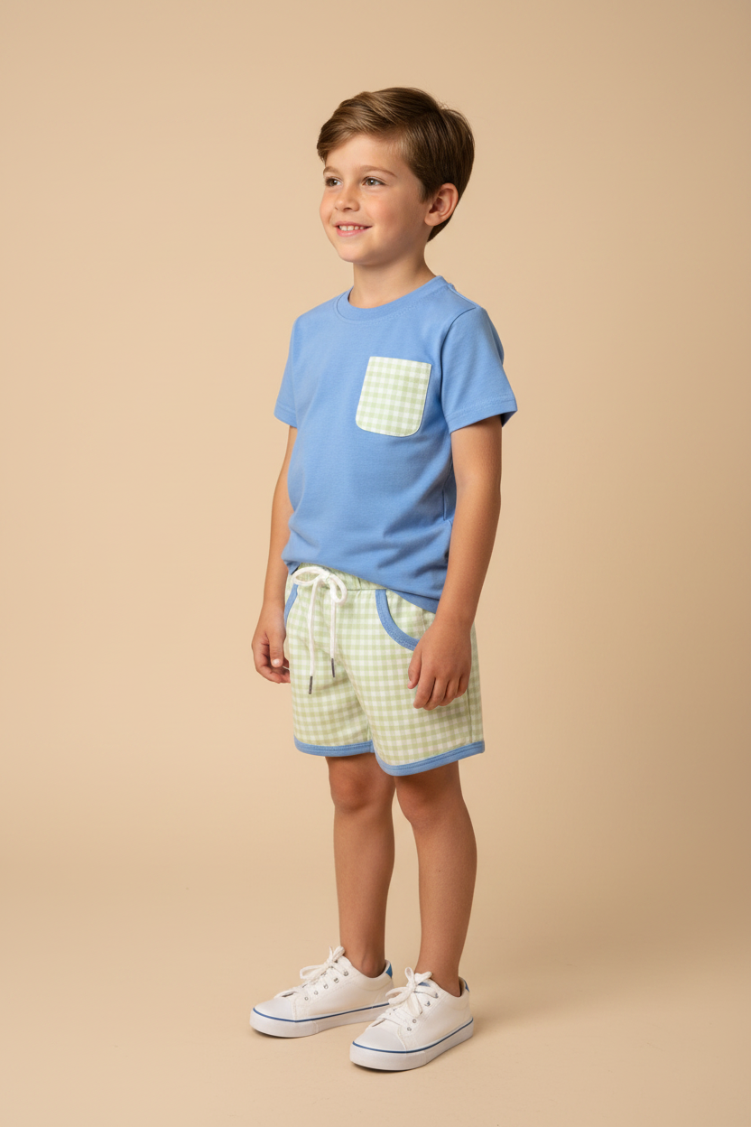 Boy model in blue tee and gingham shorts