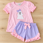 Pink puff-sleeve top with a white ghost and lavender gingham bow, paired with lavender gingham shorts with pink ruffles and a bow