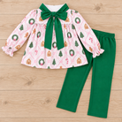 Christmas wreath and gingerbread print shirt with green pants.