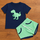Boys navy dinosaur short set with green gingham T-rex appliqué tee and coordinating green gingham shorts with navy trim, sizes 12/18M-5/6