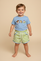 Toddler boy wearing Beyond the Toy Box Short Set on beige background