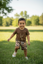 Little Boy Playing Outside in Camo Deer Set