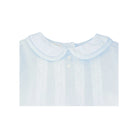 Light blue shirt with a white collar on a white background