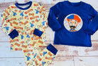 Children's pajama set with character design, one piece is blue with a character face, the other is a multicolor pattern with text 'Blippi', both with long sleeves.